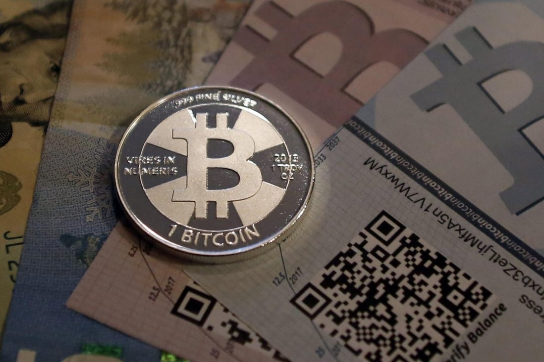 A real-life bitcoin minted by American enthusiast Mike Caldwell. The actual currency is only used electronically. Photo: Reuters