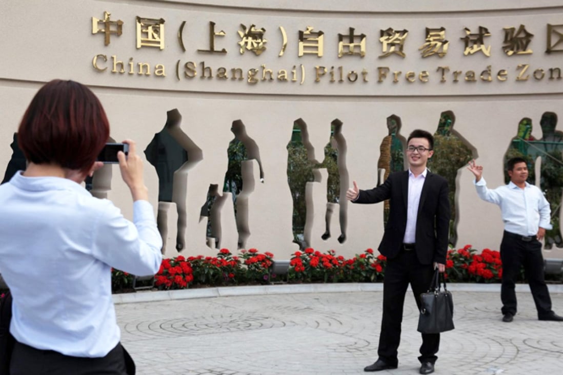 The mainland banking regulator sent questionnaires to foreign banks asking them why they were hesitant to open branches in the Shanghai free-trade zone. Photo: EPA