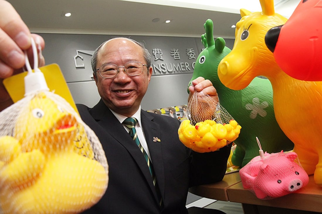 Professor Michael Hui King-man, chairman of the Consumer Council's publicity and community relations committee, displays toy samples containing extremely high levels of phthalates. Photo: KY Cheng