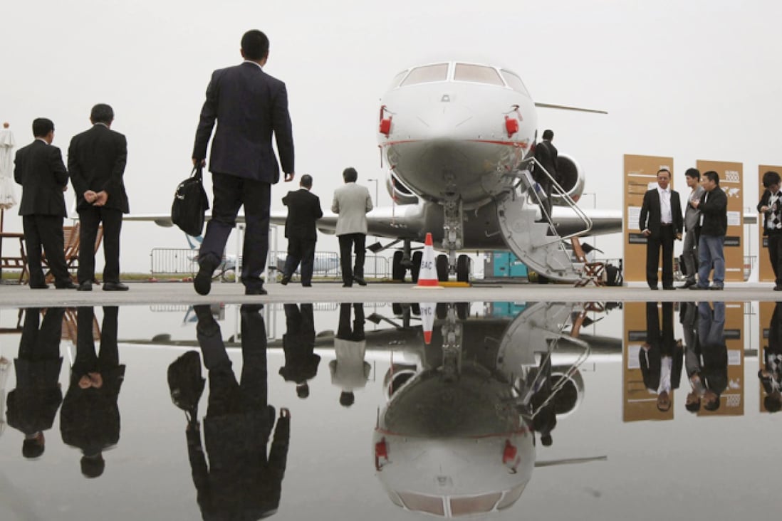Executives who want to fly within the mainland should now find it easier as some flight restrictions have been lifted, leaving decisions up to regional administration offices. Photo: AP