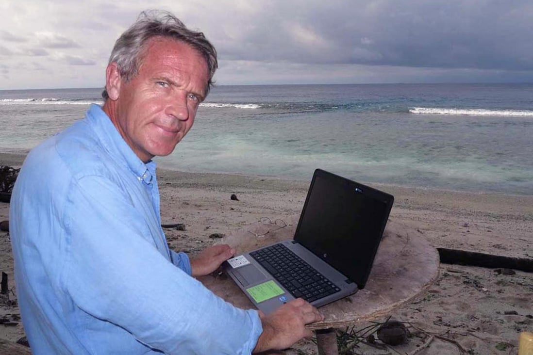 Gauthier Toulemonde, 54, telecommutes to Paris from an uninhabited Indonesian island. Photo: AFP