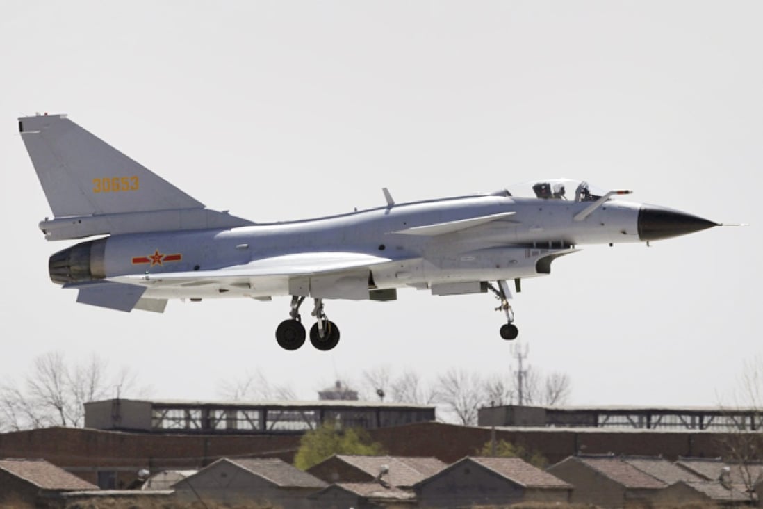 A Jian-10 fighter jet of China Air Force flying at Yangcun Air Force base on the outskirts of Tianjin municipality. The patriotic post went viral as China's new Air Defence Identification Zone sparked protests from neighbouring countries. Photo: Reuters
