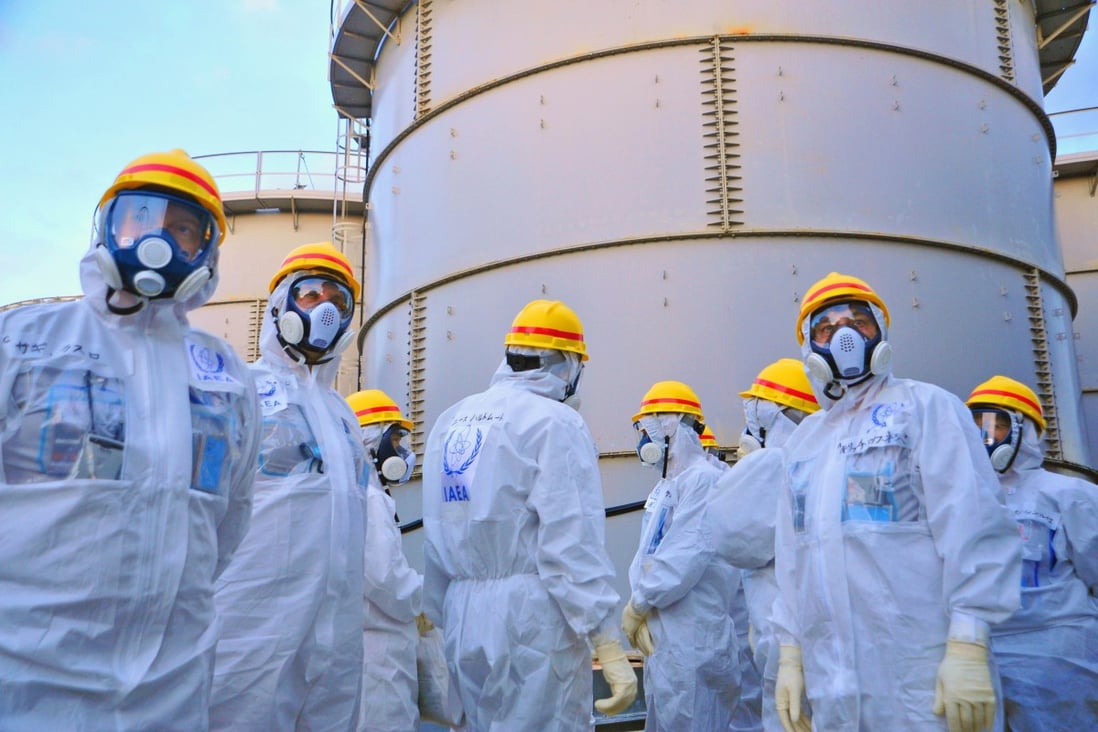 Members of an IAEA mission inspect the crippled Fukushima nuclear plant. Photo: AFP 