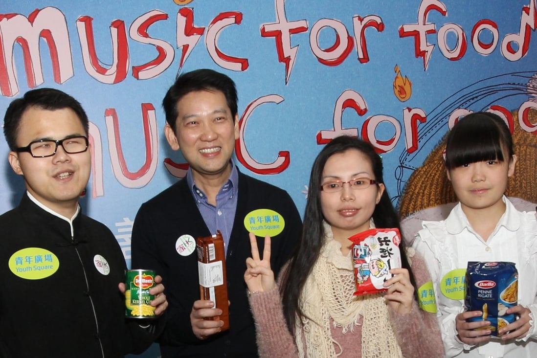 (From left) Winner Hsu, Permanent Secretary for Home Affairs Raymond Young Lap-moon, Christina Wong, and band member Cheng Yuen-lam at the first of two concerts to raise funds. Photo: David Wong
