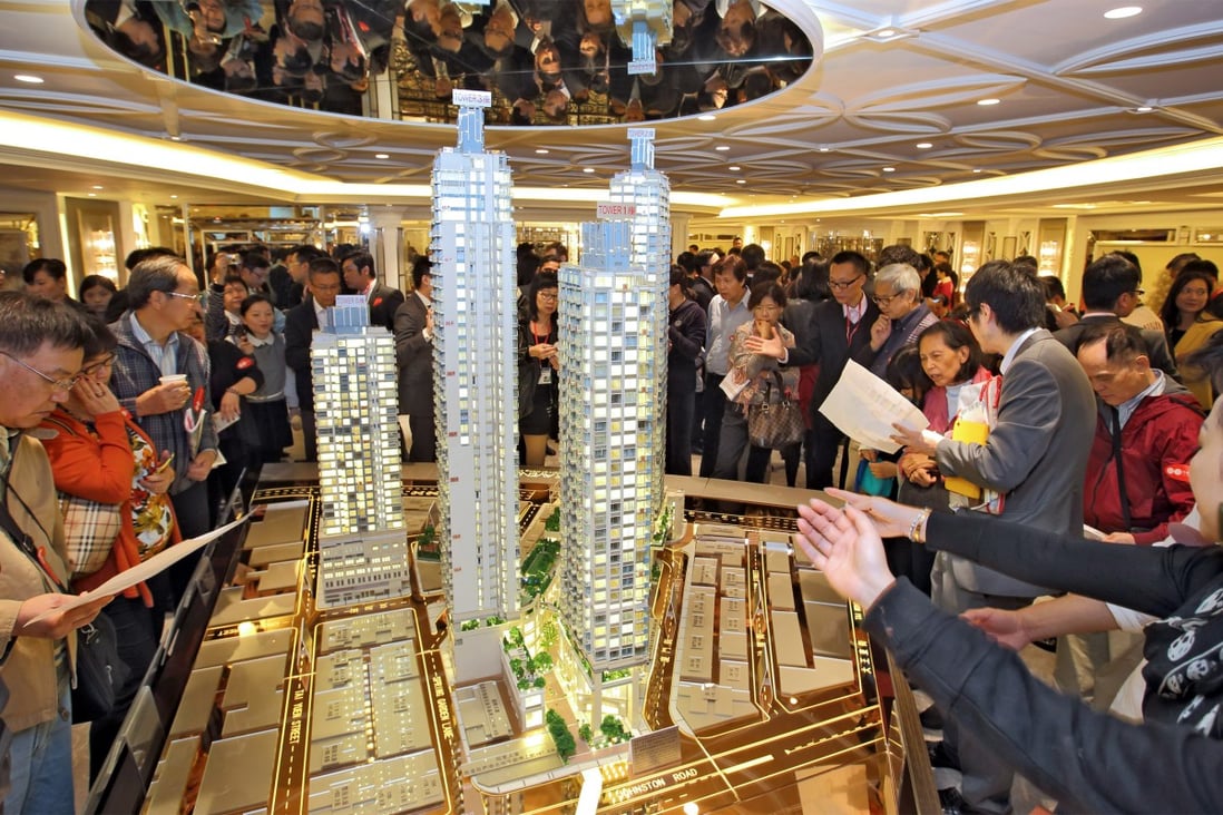 People flock to see mock-ups of The Avenue in Wan Chai, one of several recent property developments that have attracted investors and mainlanders back into the market with stamp duty subsidies. Photo: SCMP