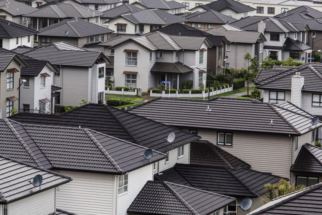 Houses stand in the suburb of Mount Wellington in Auckland, New Zealand. Photo: Bloomberg