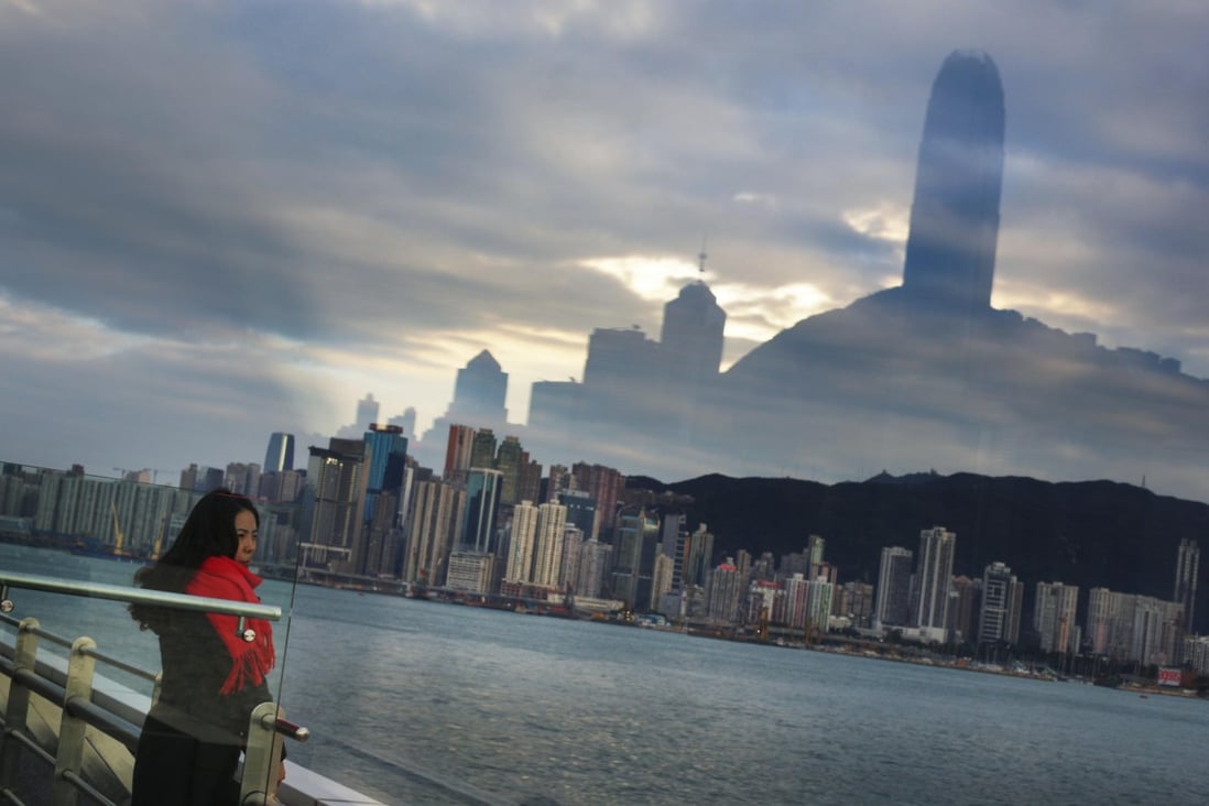 The brooding Hong Kong skyline has actually improved since rain from southern China washed away pollutants. Photo: Sam Tsang