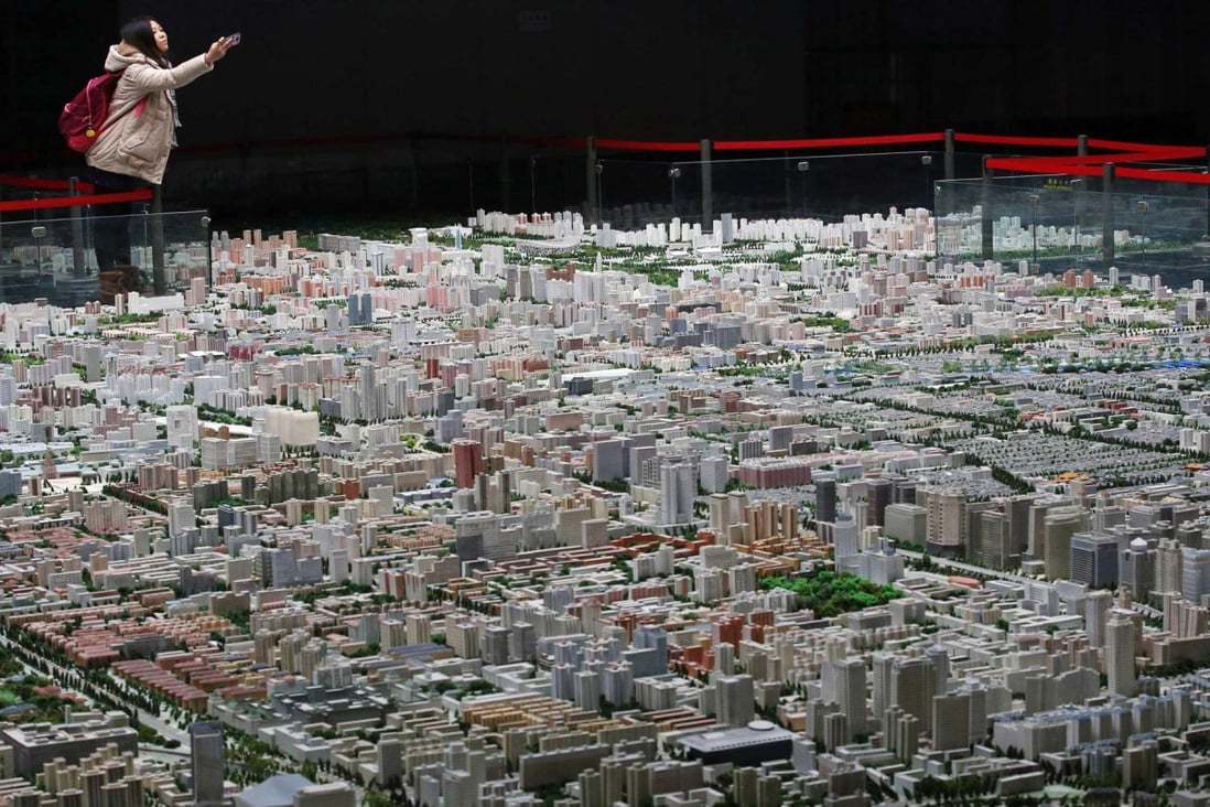 Population growth in the mainland's major cities, such as Beijing, is among factors underpinning demand for property. Photo: Reuters