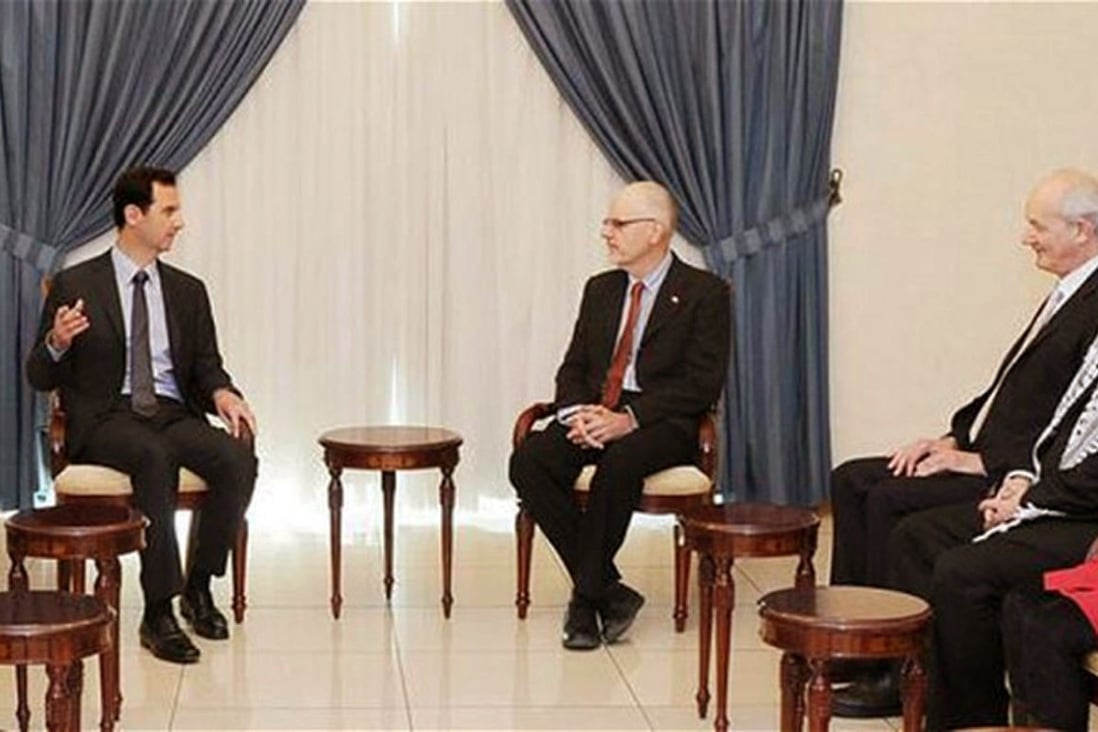 Assad meeting WikiLeaks party delegates. Photo: SCMP 
