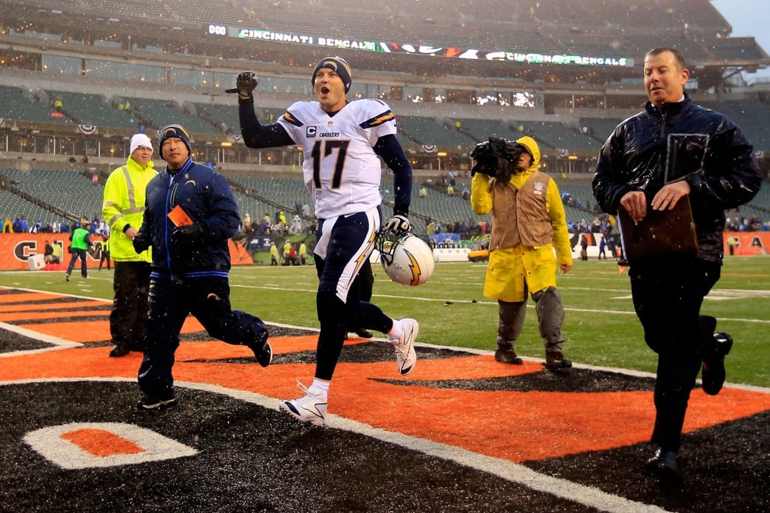Quarterback Philip Rivers of the San Diego Chargers celebrates  after defeating the Cincinnati Bengals 27-10 in a wild card play-off game at Paul Brown Stadium. Photo: AFP