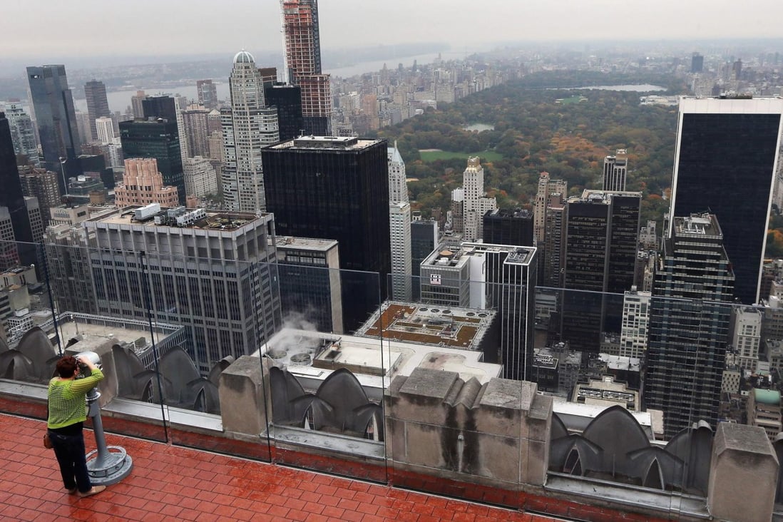 A view across Manhattan from the observation deck on New York's Rockefeller Centre - now Hong Kong and Singapore developers are eyeing opportunities there. Photo: AFP