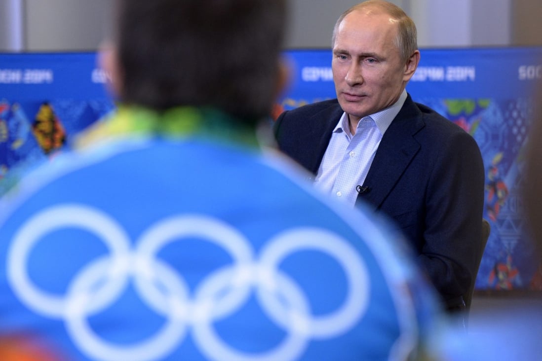 Russian President Vladimir Putin speaks at his meeting with Olympic volunteers. Photo: AP