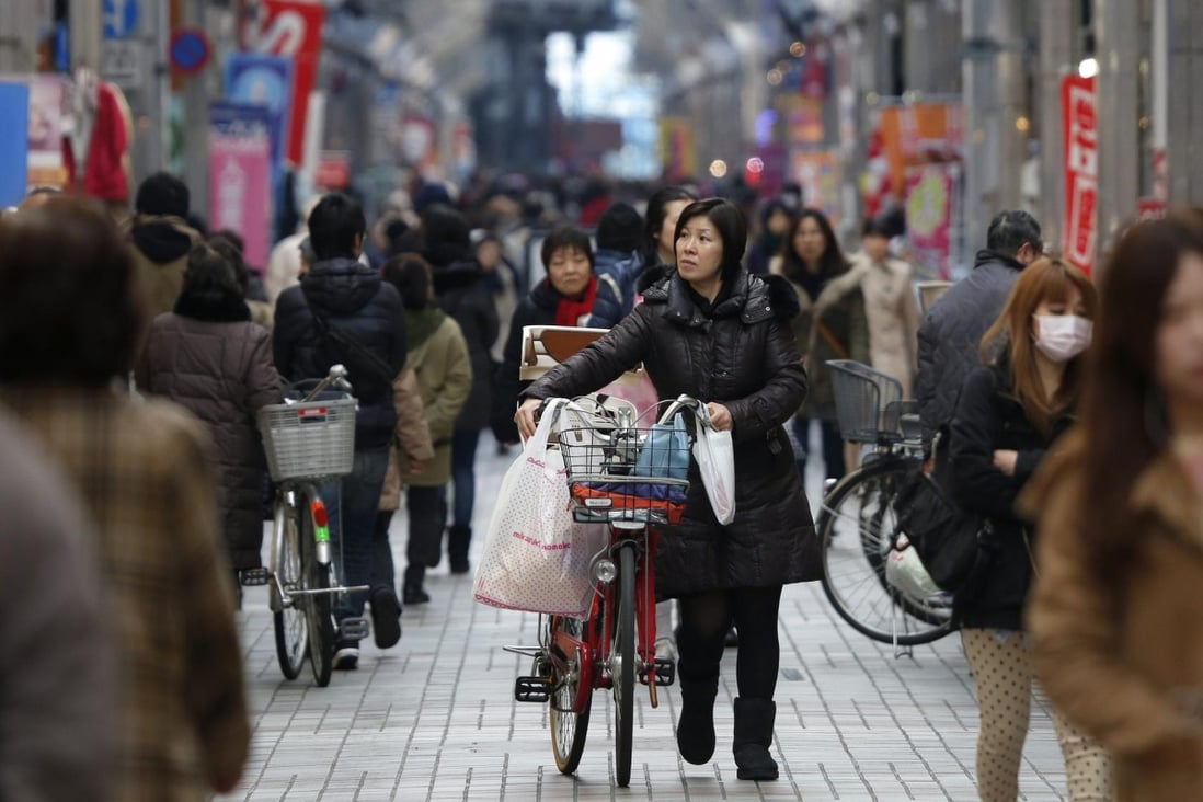 Japan's economy continues to recover, with consumer spending helping to push inflation towards a 2 per cent target. Photo: EPA