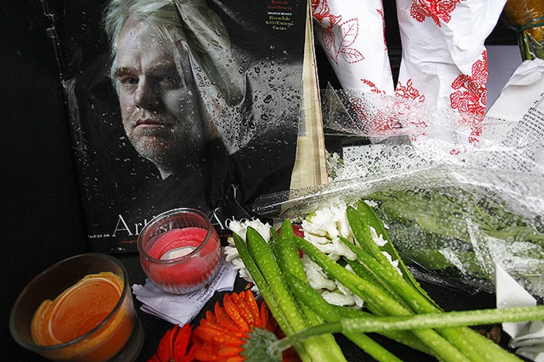 A memorial for movie actor Philip Seymour Hoffman is displayed in front of his apartment building in New York. Photo: Reuters