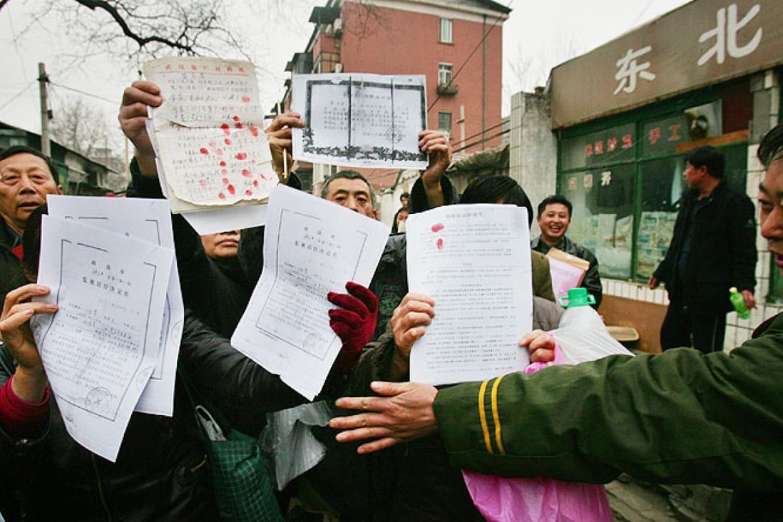 Petitioners in Beijing. Photo: AP