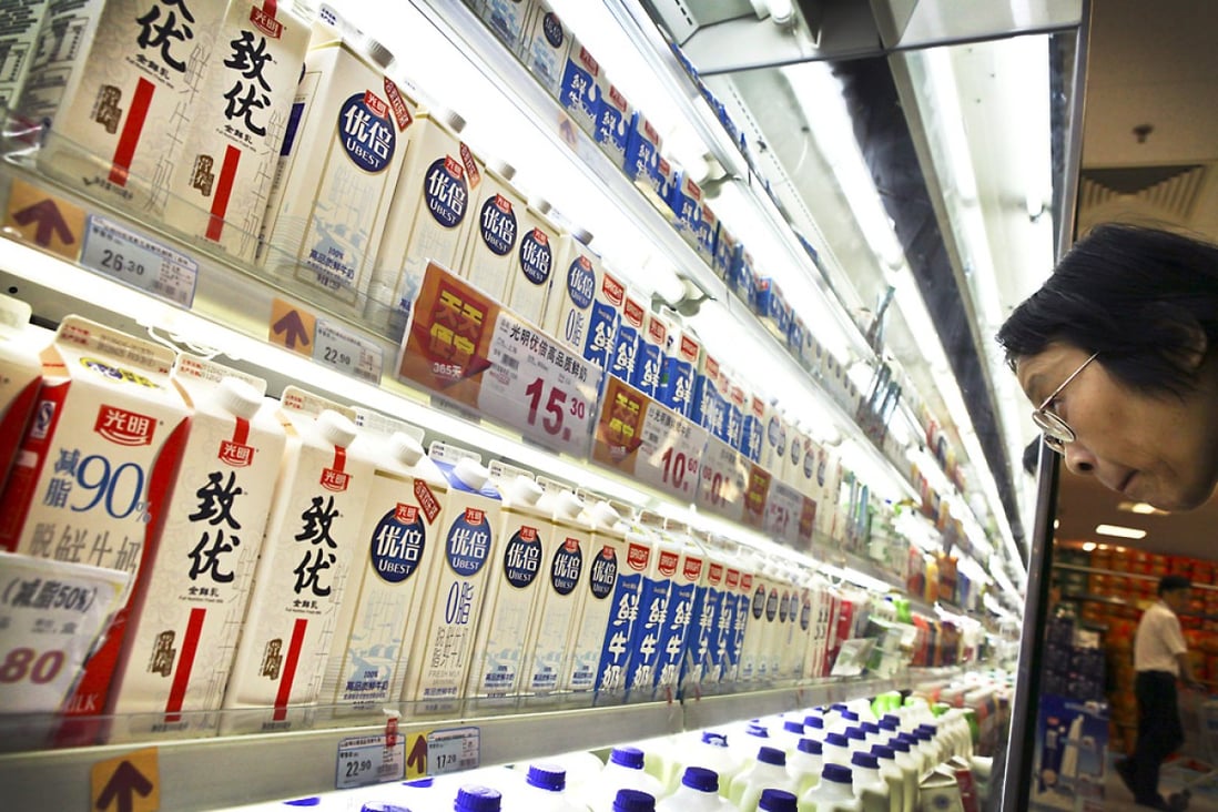 China's Bright Dairy (products shown in the picture) announced in a filing on the Shanghai exchange that RRJ Capital was investing 1.52 billion yuan in a joint venture with the company. Photo: AP