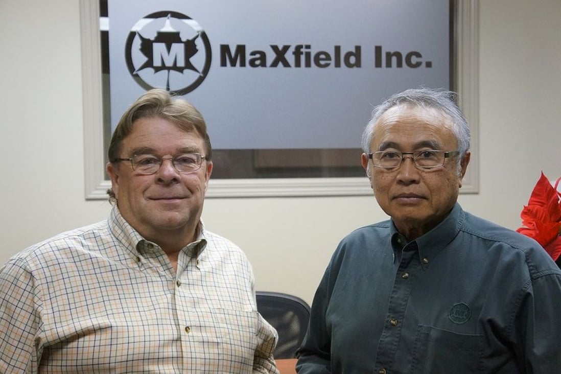 Tony Giasson (left), president and chief operating officer, and Budi Setiawan, board chair and CEO