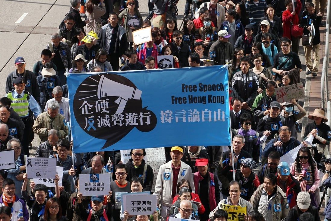 Members of The Hong Kong Journalists Association and supporters marched for press freedom last Sunday. Photo: AFP