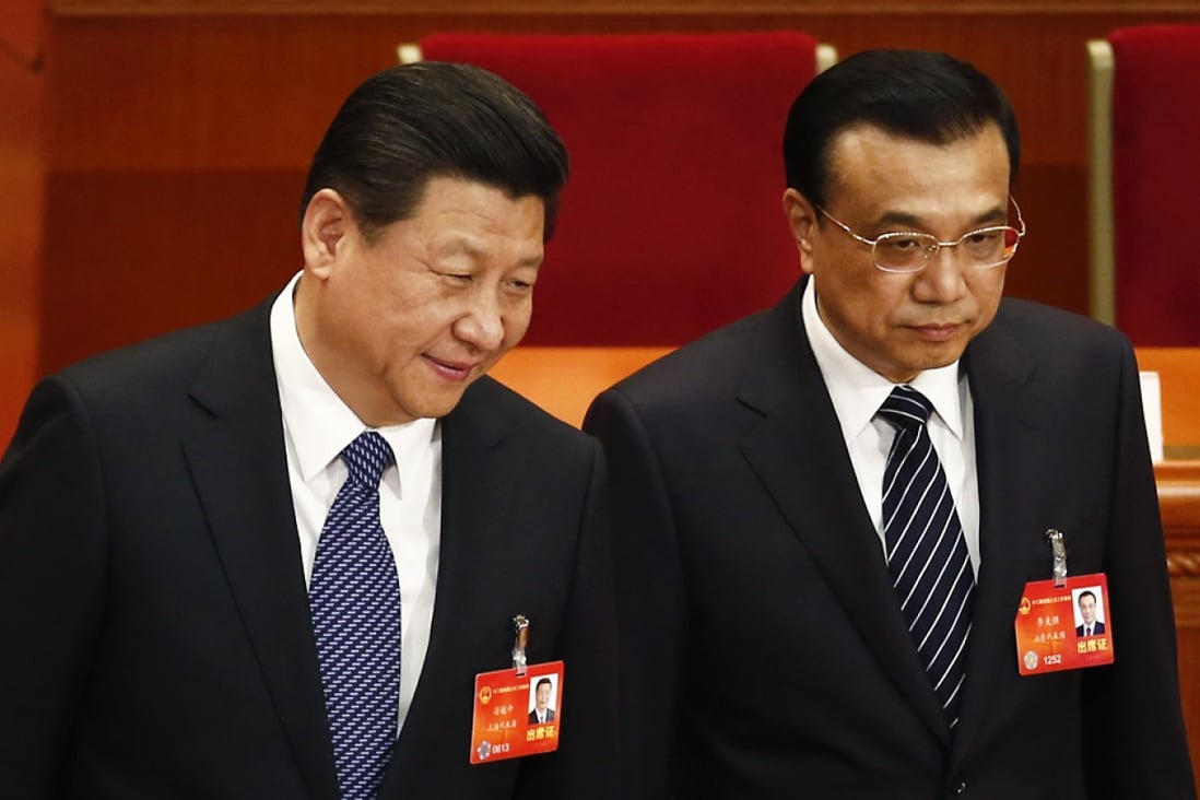 Li Keqiang (right) with Communist Party chief Xi Jinping at the closing of the National People's Congress session yesterday. Photo: AP