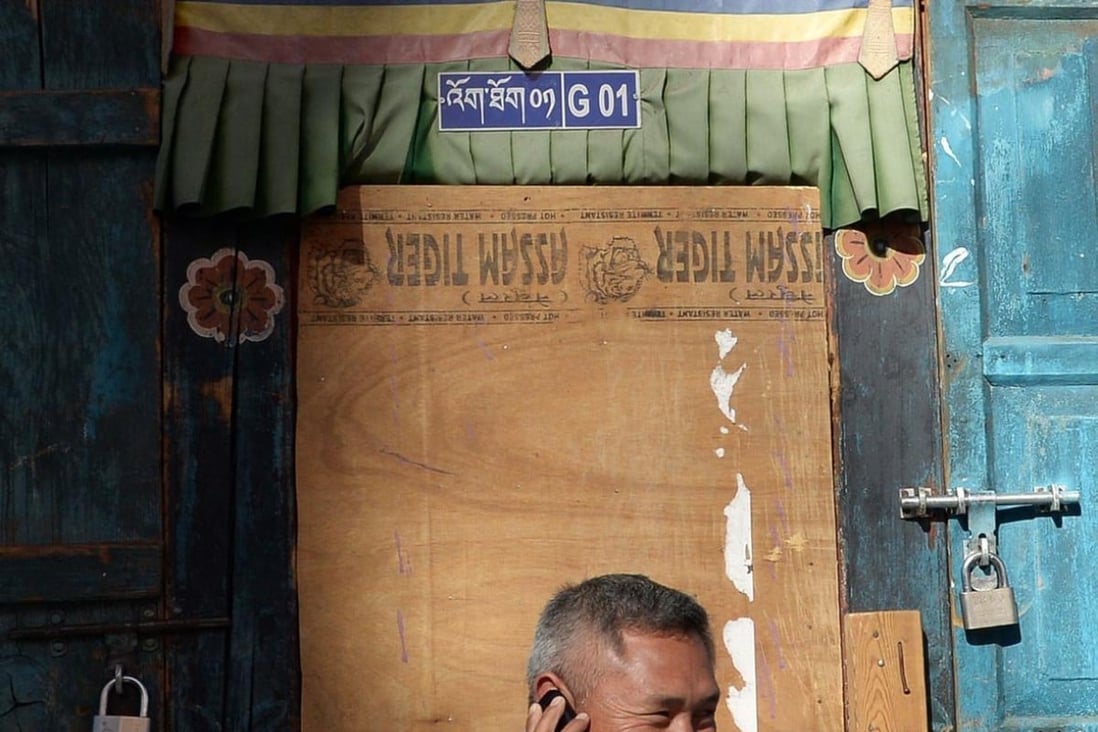 Mobile phones bring 'last Shangri-La' Bhutan into the modern world