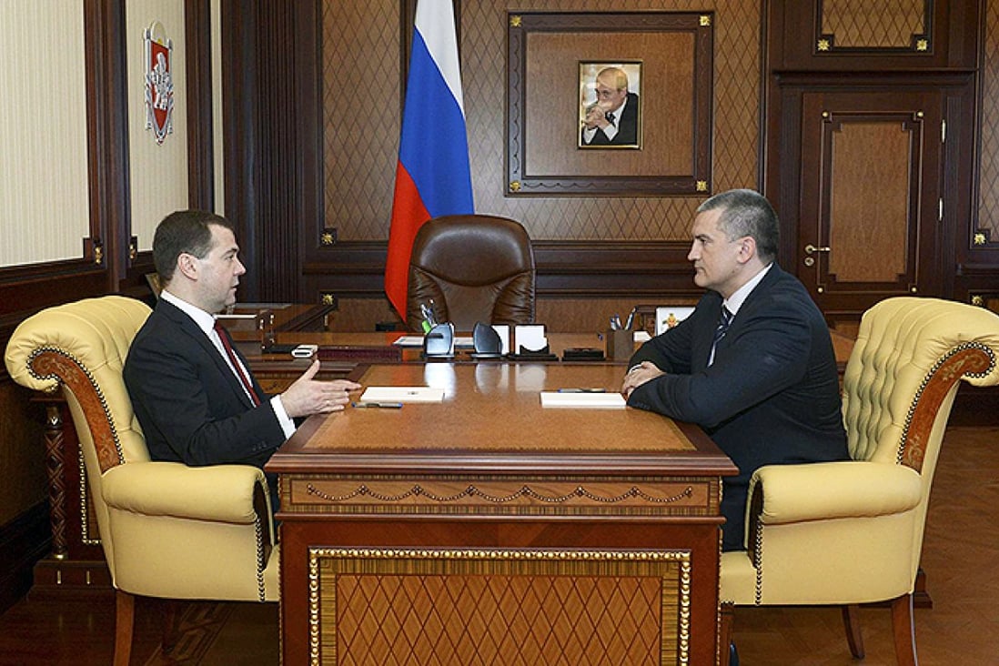 Dmitry Medvedev with Crimean PM Sergei Aksyonov. Photo: Reuters
