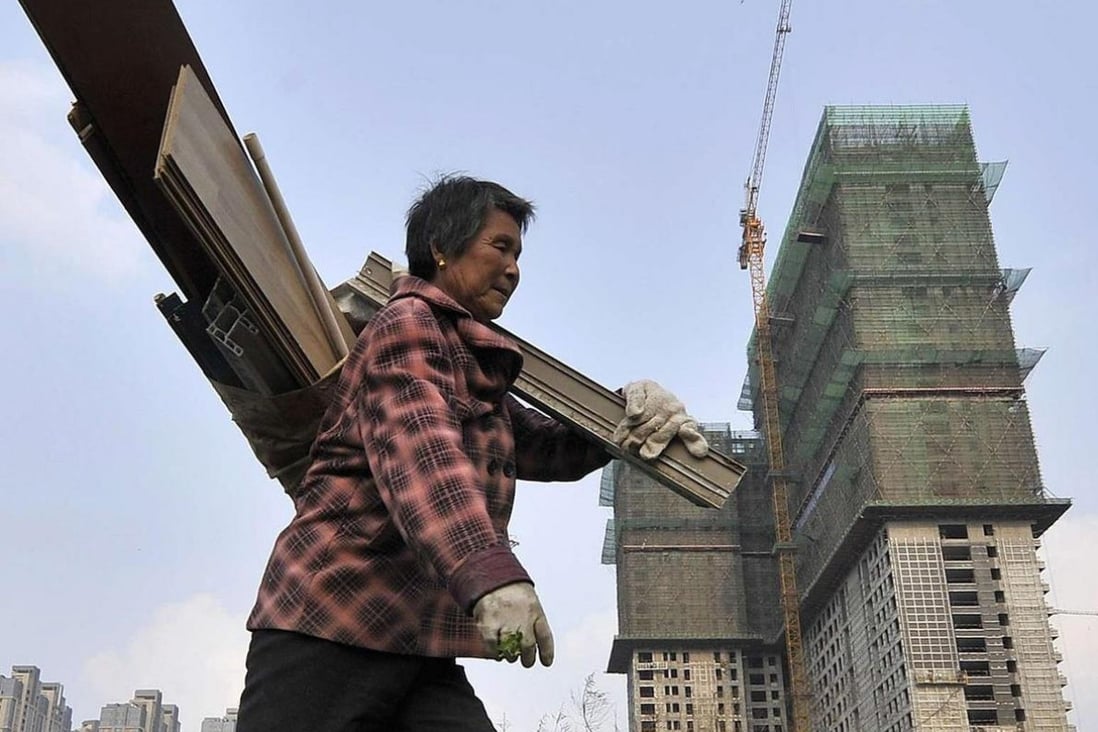 A slowdown in economic growth and a credit crunch further add to the woes facing the mainland's property developers. Photo: Reuters