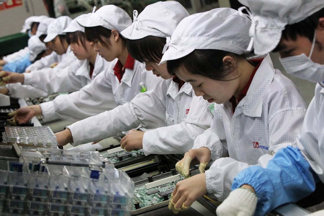 Unlike Foxconn's workers, robots don't commit suicide or demand higher wages and better working conditions. Photo: David Wong
