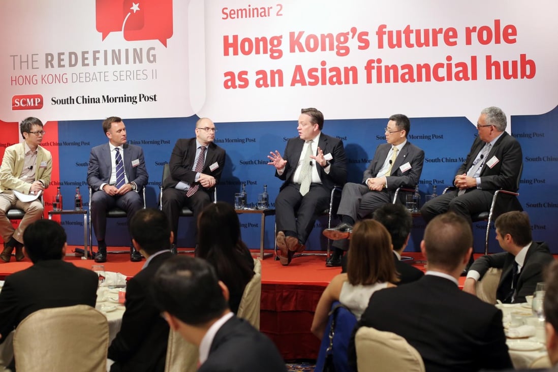 Post columnist George Chen (left) with the panel at yesterday's seminar discussing Hong Kong's role as a financial hub. Photo: K.Y. Cheng