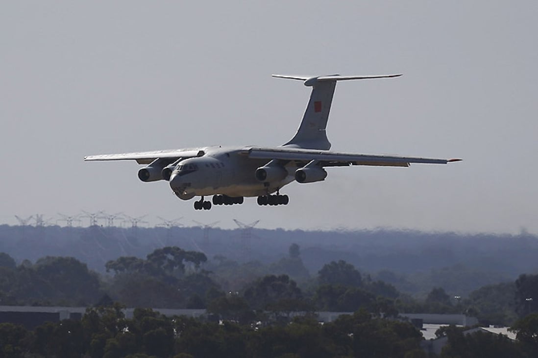 A Chinese Ilyushin IL-76 lands in Perth after returning from the search for missing Malaysia Airlines Flight 370. Photo: AP