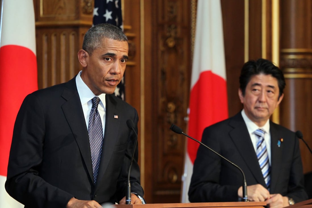 US President Barack Obama (left) attends a press conference with Japanese Prime Minister Shinzo Abe at the Akasaka guesthouse in Tokyo. Photo: Xinhua