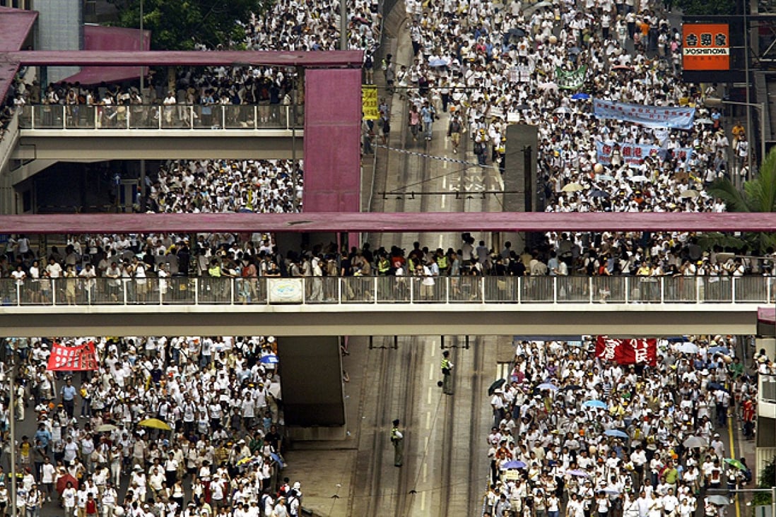 Demonstrators marking the seventh anniversary of the handover crowd into Wanchai on July 1, 2004 . Photo: SCMP Pictures
