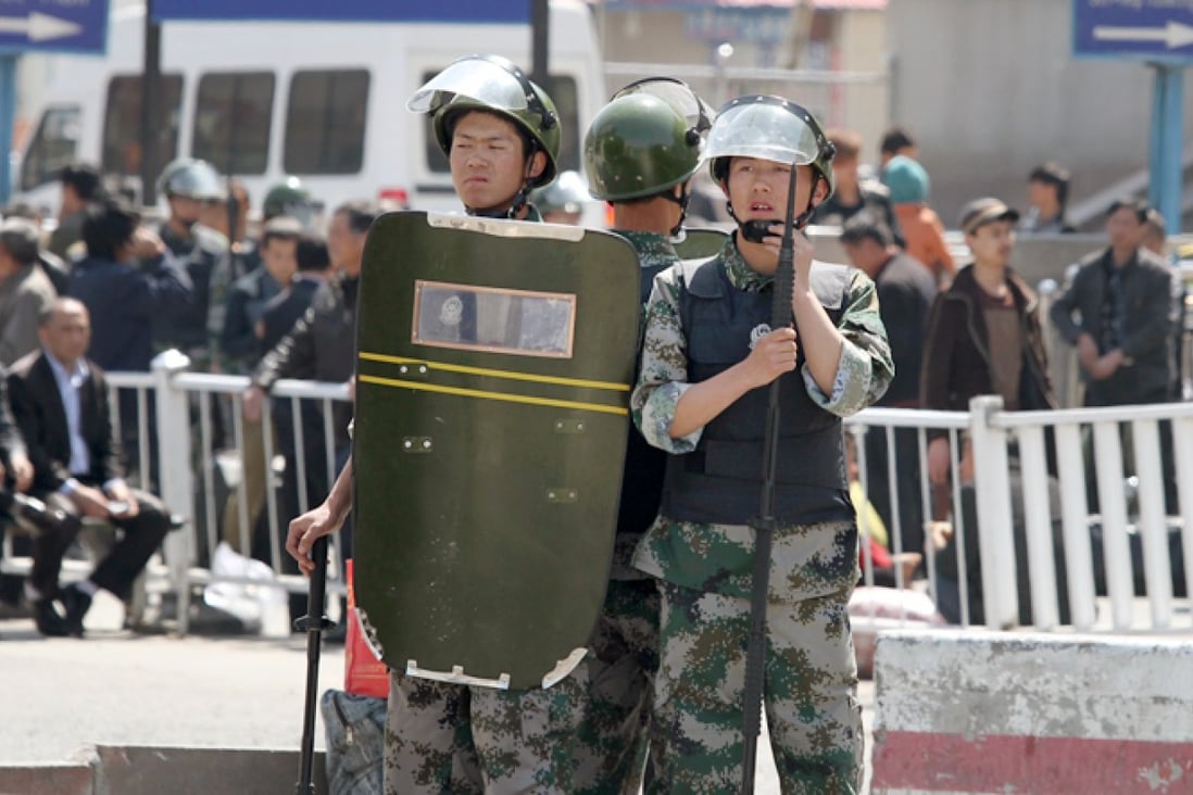 Armed police at the scene of the explosion in Urumqi. Photo: Simon Song