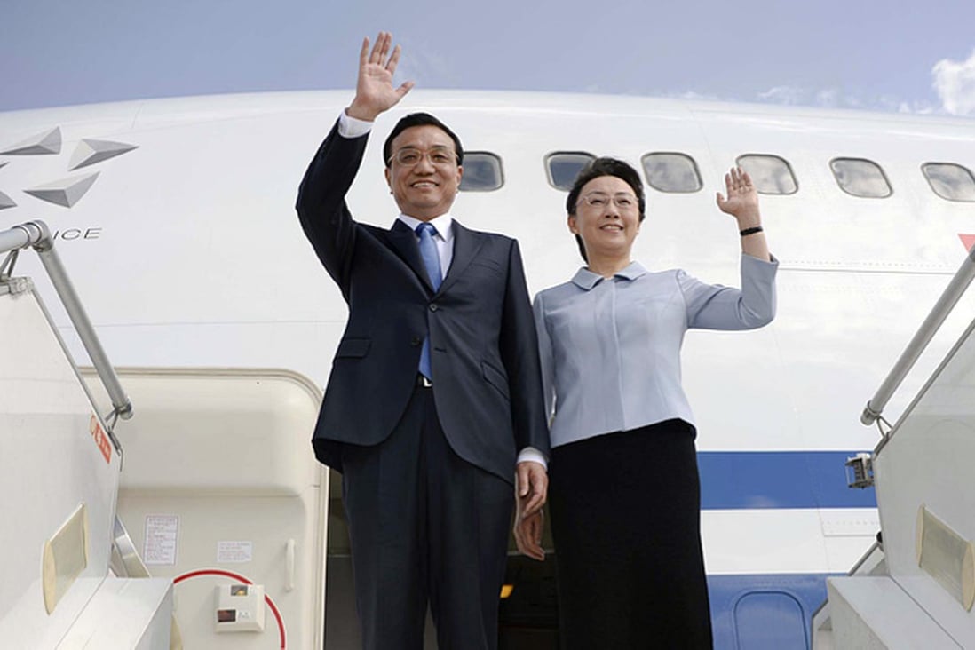 Li Keqiang and wife Cheng Hong arrive in Ethiopia. Photo: CNS