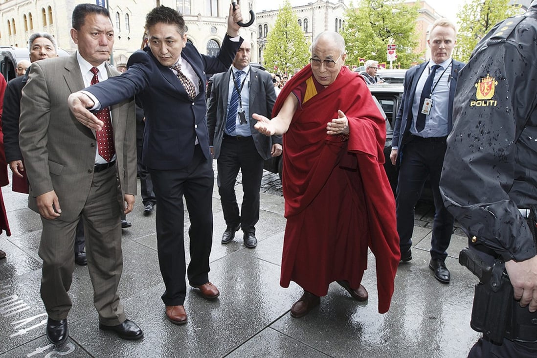 Tibetan spiritual leader the Dalai Lama arrives in Oslo on Wednesday. Photo: EPA