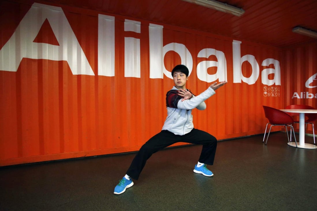 A shadow-boxing performance during an open day at Alibaba Group's office in Hangzhou. The firm is leading the way to improving China's logistics infrastructure. Photo: AP