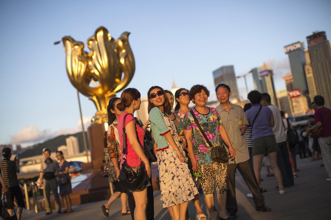 Immigration Department figures show the number of mainland tourists dropped 1.5 per cent year on year during the three-day national holiday. Photo: Bloomberg