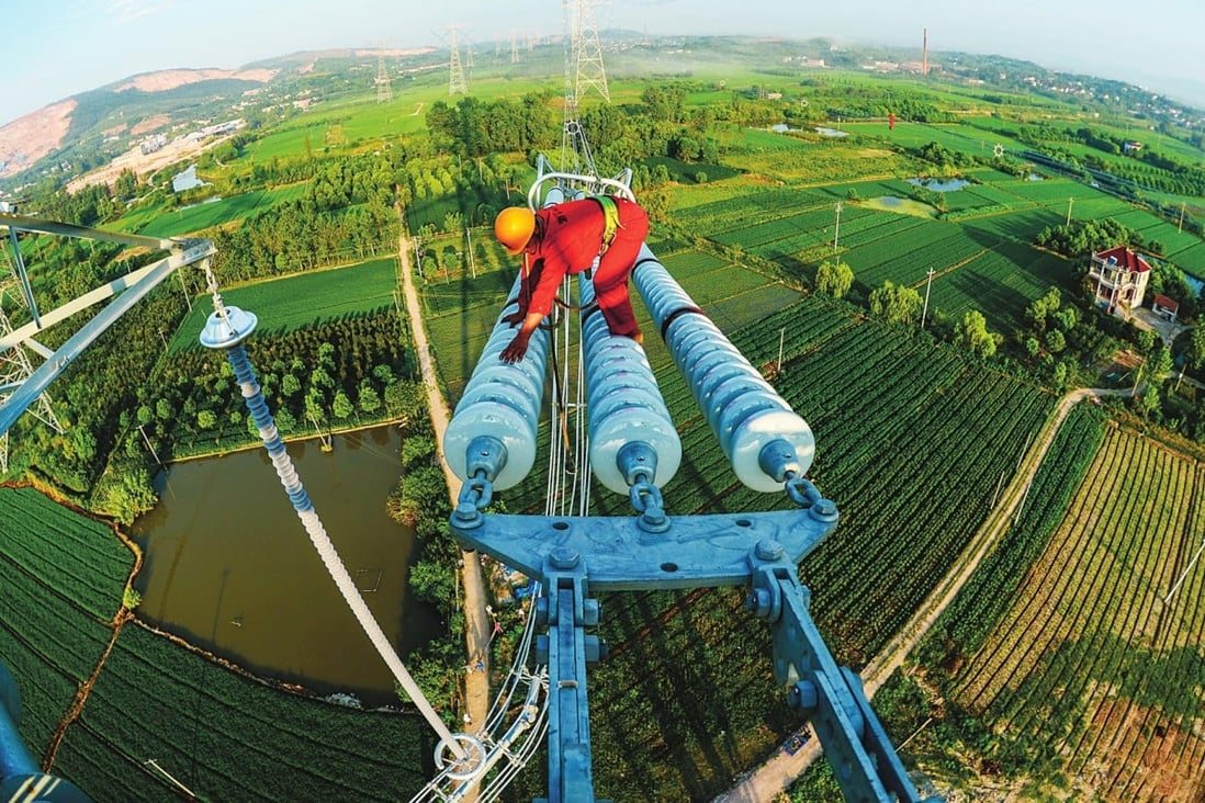 Work is progressing on a UHV power line in Zhejiang. The State Grid Corporation plans 12 such lines across China. Photo: SCMP