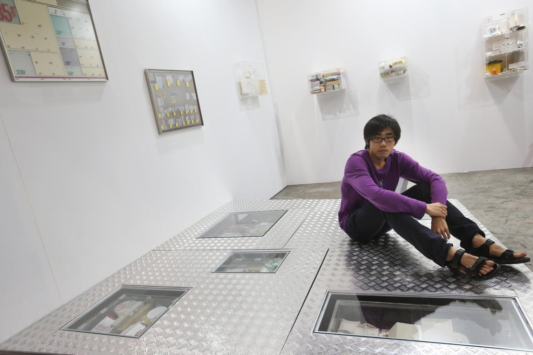 Hong Kong artist Tang Kwok-hin with his workThe Weak Are Meatat last year's Art Basel. He is returning to the show. Photo: Sam Tsang