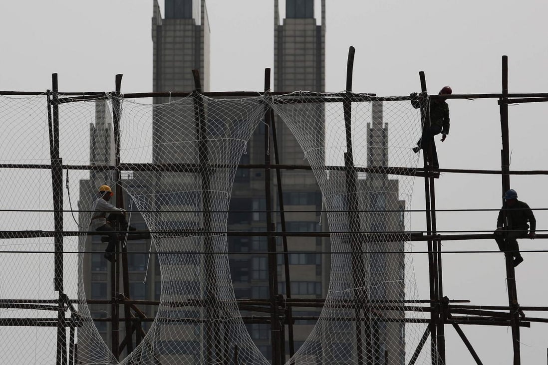 The government will be reluctant to ease restrictions on property in order to effectively manage the sector, economists say. Photo: Reuters