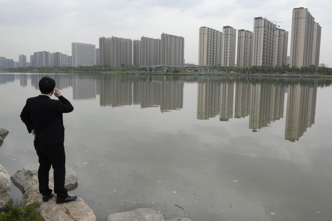 Ratings agency Moody's has downgraded the mainland property to negative from stable. Photo: Reuters