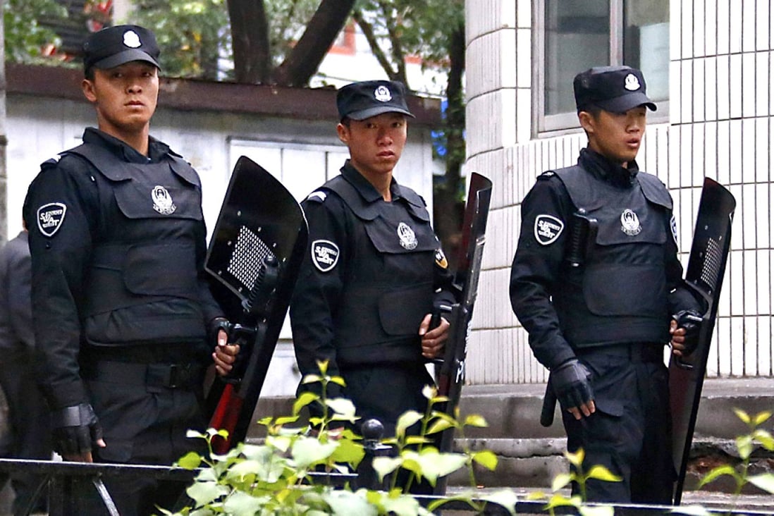 Police in riot gear on patrol in Urumqi, the Xinjiang capital. Photo: Reuters  