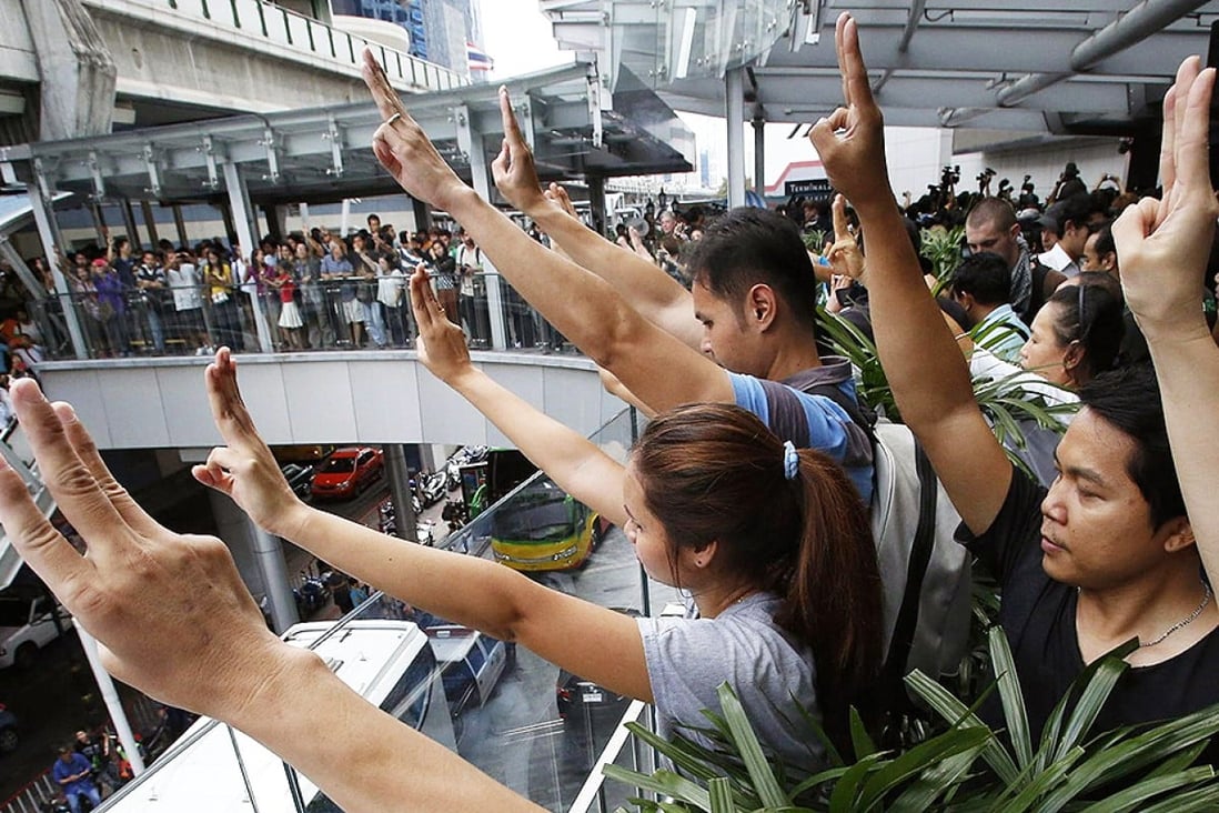Thai antijunta protesters enlist Hunger Games salute as act of