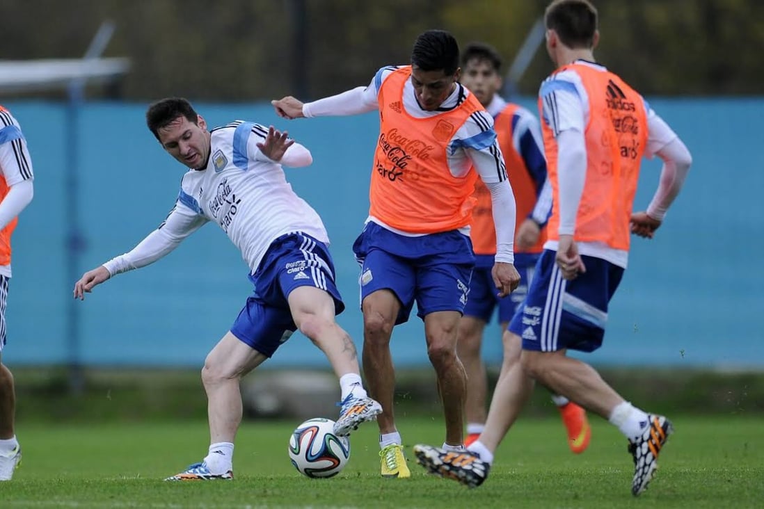 Argentina's Lionel Messi (left) in action during a training session of the national team in Ezeiza, Buenos Aires. Photo: EPA