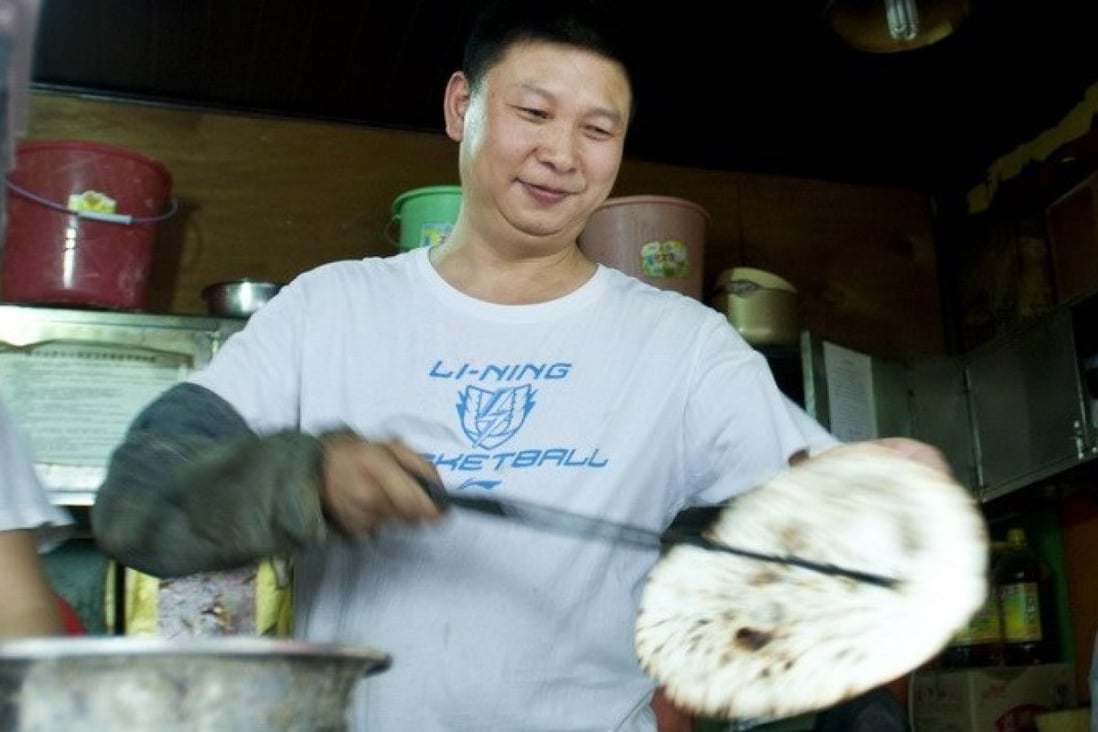 Meet Xi Jinping's lookalike Meat pie hawker cuts a presidential figure
