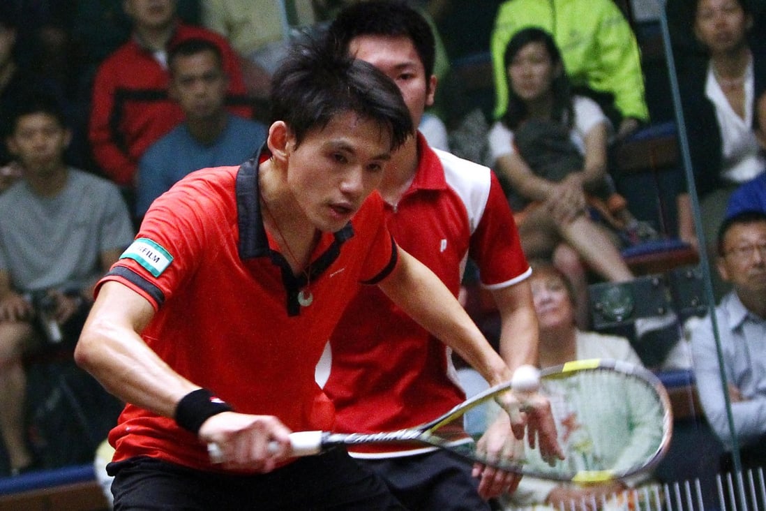 Max Lee plays a shot against Leo Au in the men's final of the Hong Kong Squash Championships in Admiralty. Photo: Jonathan Wong