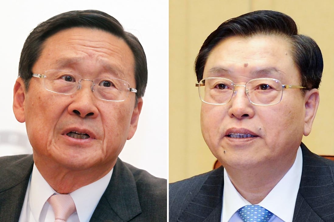 The central government had made its stance very clear in remarks by various officials, including National People's Congress chairman Zhang Dejiang (right), and Peter Woo (left) said it was in no mood to make concessions in the election of Hong Kong's chief executive or on electoral reform. Photos: K.Y. Cheng, Xinhua
