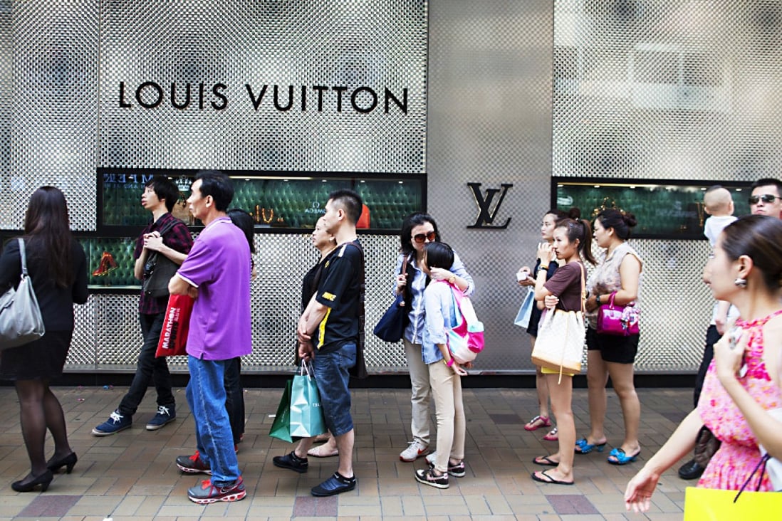 In the face of slowing sales of luxury goods to mainlanders, retailers are turning cautious in their rental spending. Photo: EPA