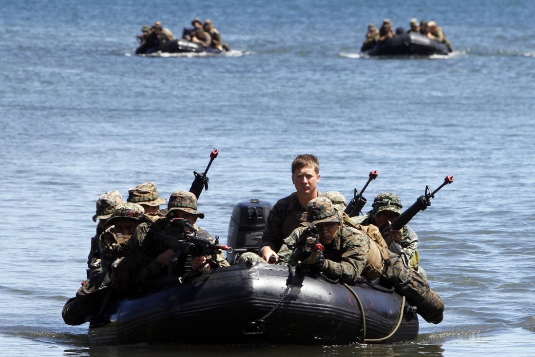 Philippine and US marines during an amphibious raid as part of a joint military exercise in Ulugan Bay in April. Photo: Reuters