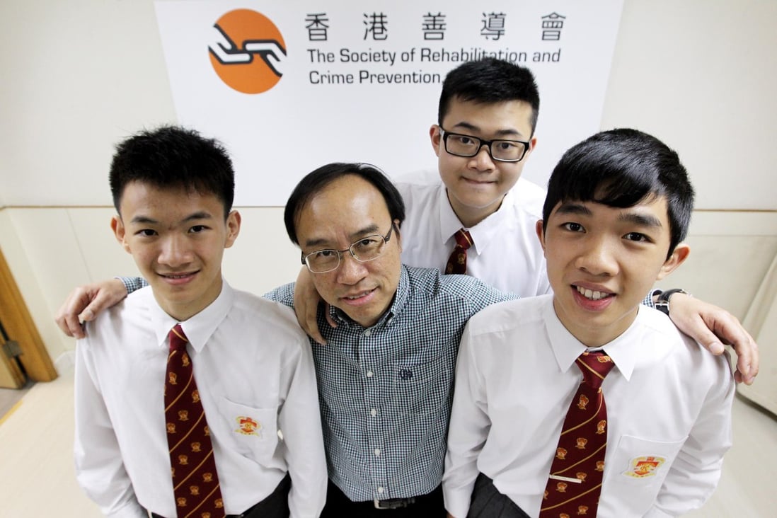 Society chief executive Andy Ng with King's College students (from left) Terrence Cheng, Eugene Huang and Chester Cheng. Photo: Edward Wong