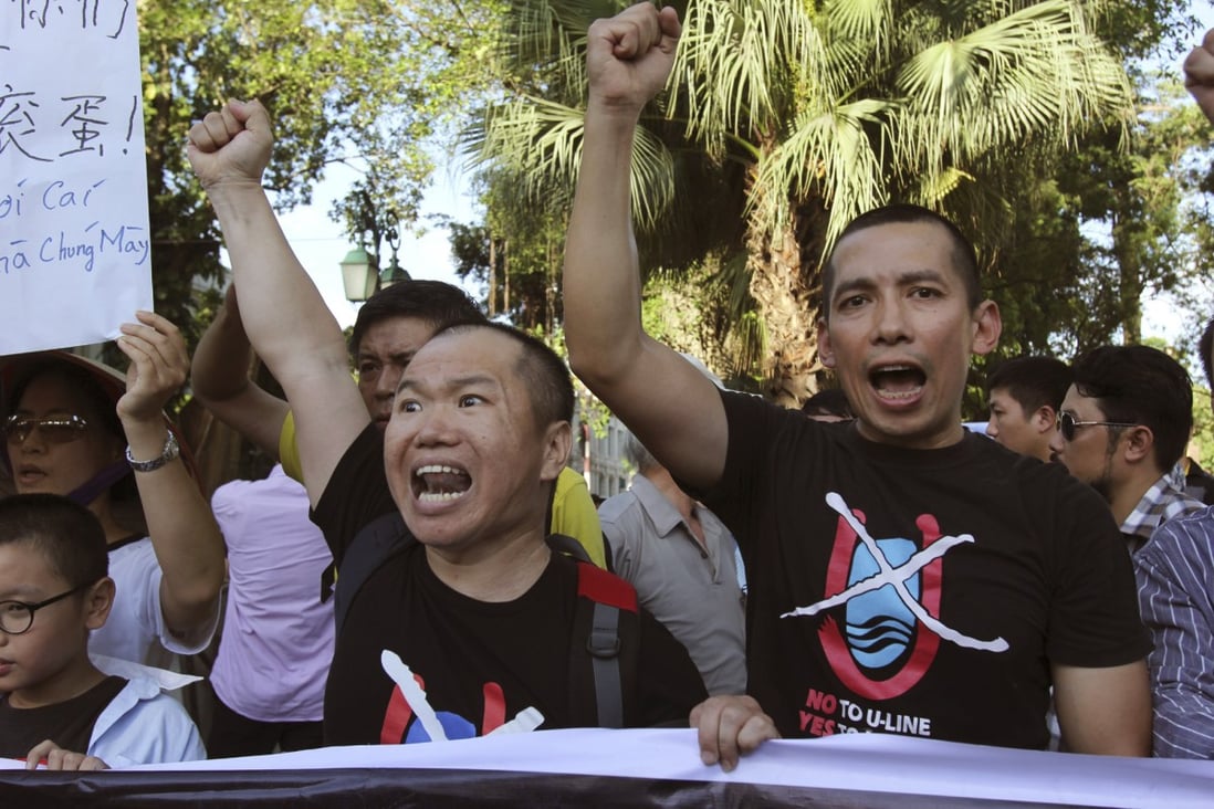 Vientnamese protesters chant anti-China slogans in Hanoi, yesterday after China said it was moving a second oil rig closer to Vietnam's coast. Photo: AP